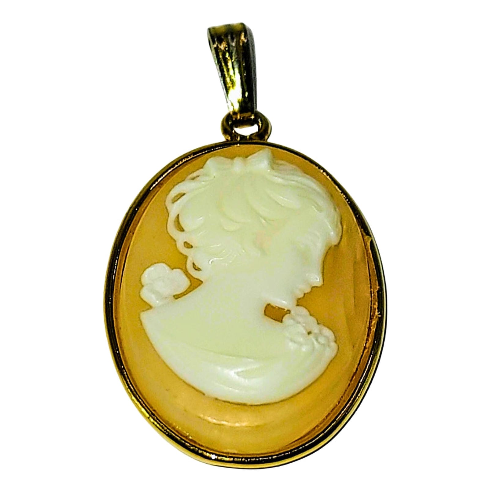 Oval Shell Cameo set in gold bezel. Young female profile w/blossoms